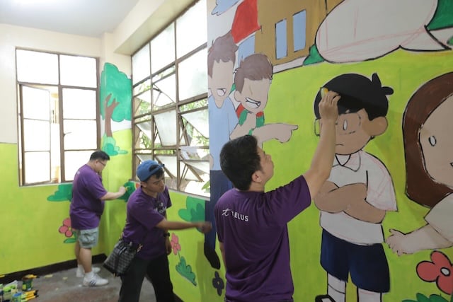 Over 1,300 volunteers from TELUS Digital Philippines transform century-old school ahead of the new school year