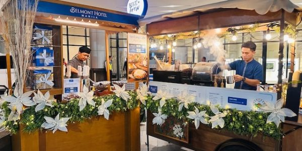 Simbang Gabi Favorites and the Bike + Brew kiosk at the Belmont Hotel Manila driveway.